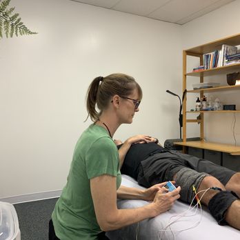 Tracy Heilers - FSM set up for a knee injury - Massage Therapy Near Me - St. Charles, Illinois Tracy Heilers - FSM set up for a knee injury - Massage Therapy Near Me - St. Charles, Illinois