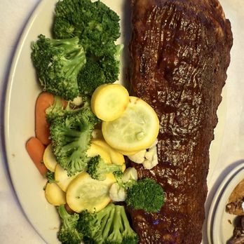 Manny'S Original Chophouse - Full rack of ribs w/ veggies - Steakhouses Near Me - Lake Wales, Florida Manny'S Original Chophouse - Full rack of ribs w/ veggies - Steakhouses Near Me - Lake Wales, Florida