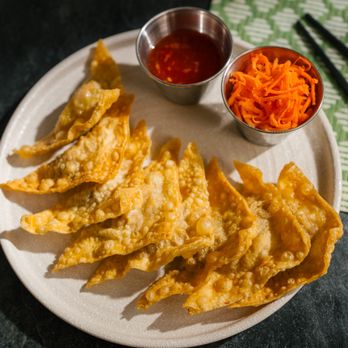 Hem Social - a plate of food on a table - Vietnamese Near Me - Toronto, Ontario
