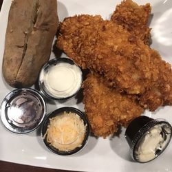 Freedom Chophouse - Catfish meal with baked potato