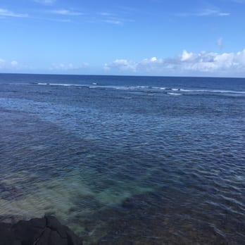 Sea Lodge Beach - Standing on the rocks looking out on the ocean... - Beaches Near Me - Princeville, Hawaii Sea Lodge Beach - Standing on the rocks looking out on the ocean... - Beaches Near Me - Princeville, Hawaii