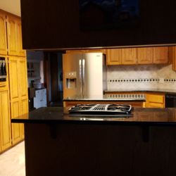 True North Builders - Kitchen before remodel. Dark and uninviting.