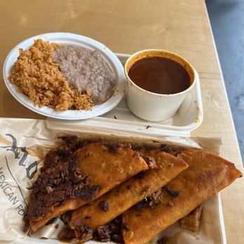 Rojo’s Mexican Food - Birria tacos + broth, small side of rice and beans - Tacos Near Me - Seattle, Washington Rojo’s Mexican Food - Birria tacos + broth, small side of rice and beans - Tacos Near Me - Seattle, Washington