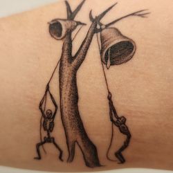 UpRise Tattoos - Close up of tattoo in artificial light