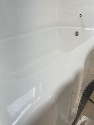 Bathtub Reglazing - This remodel was done on an old bathtub that the customer wanted to replace, after explaining the process she decided to reglaze and save money! She was very happy with the results. Bathtub Reglazing - This remodel was done on an old bathtub that the customer wanted to replace, after explaining the process she decided to reglaze and save money! She was very happy with the results.