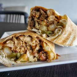 Osmow's Shawarma - Full flavor wrap (pickles, fries, garlic sauce)