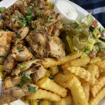 Pita Pockets - Shewarma chicken with rice and fries on the side. - Middle Eastern Near Me - Hollywood, Florida Pita Pockets - Shewarma chicken with rice and fries on the side. - Middle Eastern Near Me - Hollywood, Florida