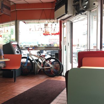Emilio's Pizza - Delivery bikes and an ATM - Pizza Near Me - Bronx, New York Emilio's Pizza - Delivery bikes and an ATM - Pizza Near Me - Bronx, New York
