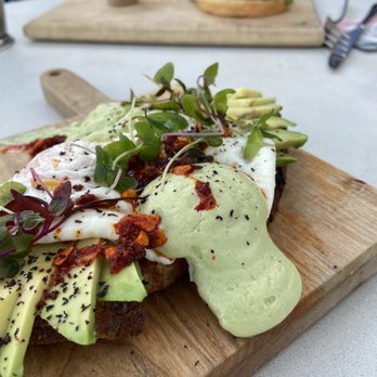 L.A. Jackson - Avocado Toast and Burger in distance - Cocktail Bars Near Me - Nashville, Tennessee L.A. Jackson - Avocado Toast and Burger in distance - Cocktail Bars Near Me - Nashville, Tennessee