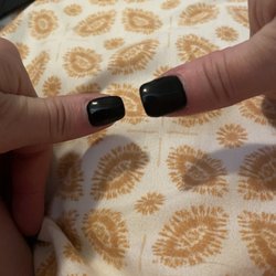 Nails with Love - Right is the thumb they did and the left is one I had done at another nail salon. I had to come home and file the hell outta the nail