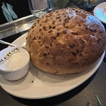 Morton's The Steakhouse - The famous delicious warm onion bread with soft butter it's almost as big as my head lol! - Steakhouses Near Me - Atlantic City, New Jersey Morton's The Steakhouse - The famous delicious warm onion bread with soft butter it's almost as big as my head lol! - Steakhouses Near Me - Atlantic City, New Jersey