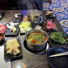 Individual hot pots with selection of menu items Individual hot pots with selection of menu items