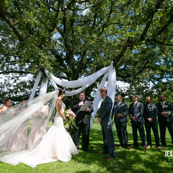 Morgan Creek Vineyards - a bride and groom with their wedding party - Wineries Near Me - New Ulm, Minnesota