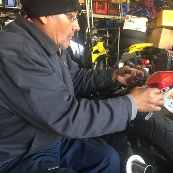 Richard Motorcycle - Richard working on a Ducati Monster - Motorcycle Dealers Near Me - Hawthorne, California Richard Motorcycle - Richard working on a Ducati Monster - Motorcycle Dealers Near Me - Hawthorne, California