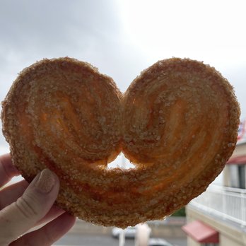 Chez Michel - a hand holding a pastry shaped like a heart - Patisserie/Cake Shop Near Me - West Cape May, New Jersey Chez Michel - a hand holding a pastry shaped like a heart - Patisserie/Cake Shop Near Me - West Cape May, New Jersey
