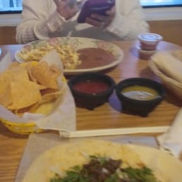 barbacoa and potato and egg tacos. barbacoa and potato and egg tacos.