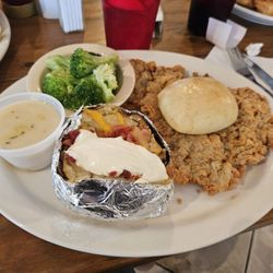Nolan's Restaurant - Chicken fried steak with loaded baked potato and broccoli