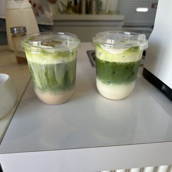 Ren Coffee Cart - Left: Salted Pistachio Matcha w. Pistachio milk Right: Caramel Maple Matcha w. Whole milk - Coffee & Tea Near Me - Davie, Florida Ren Coffee Cart - Left: Salted Pistachio Matcha w. Pistachio milk Right: Caramel Maple Matcha w. Whole milk - Coffee & Tea Near Me - Davie, Florida