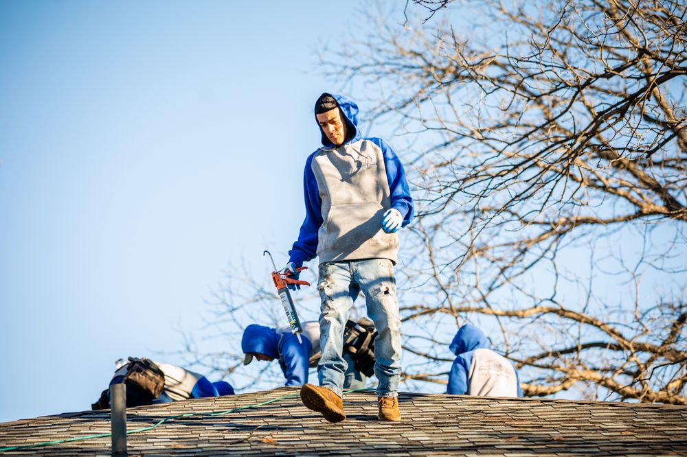 Slide of Frank Phillips Roofing