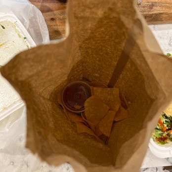 Cactus Flower Cafe - 10 whole chips with a hand full of crumbs provided with an order of chips and salad. - Mexican Near Me - Pensacola, Florida