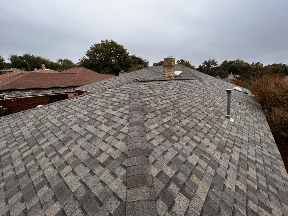 Slide of Homer’s Roofing & Construction