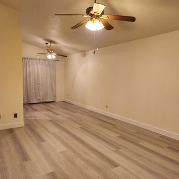 Prime floor - a living room with a ceiling fan - Flooring Near Me Prime floor - a living room with a ceiling fan - Flooring Near Me