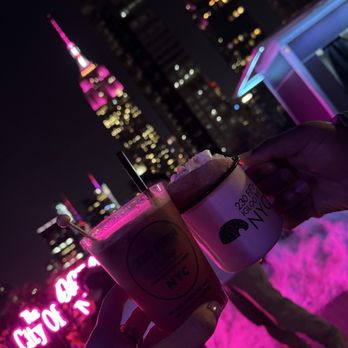 230 Fifth Rooftop Bar - Raspberry mojito and hot boozy cider with donut - Cocktail Bars Near Me - New York, New York