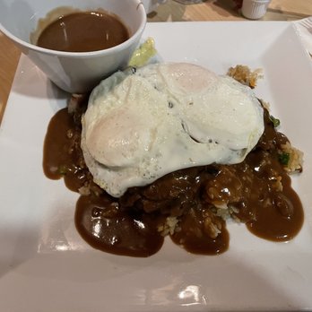 Liliha Bakery - Loco moco with garlic fried rice, shown with extra gravy - Bakeries Near Me - Honolulu, Hawaii Liliha Bakery - Loco moco with garlic fried rice, shown with extra gravy - Bakeries Near Me - Honolulu, Hawaii