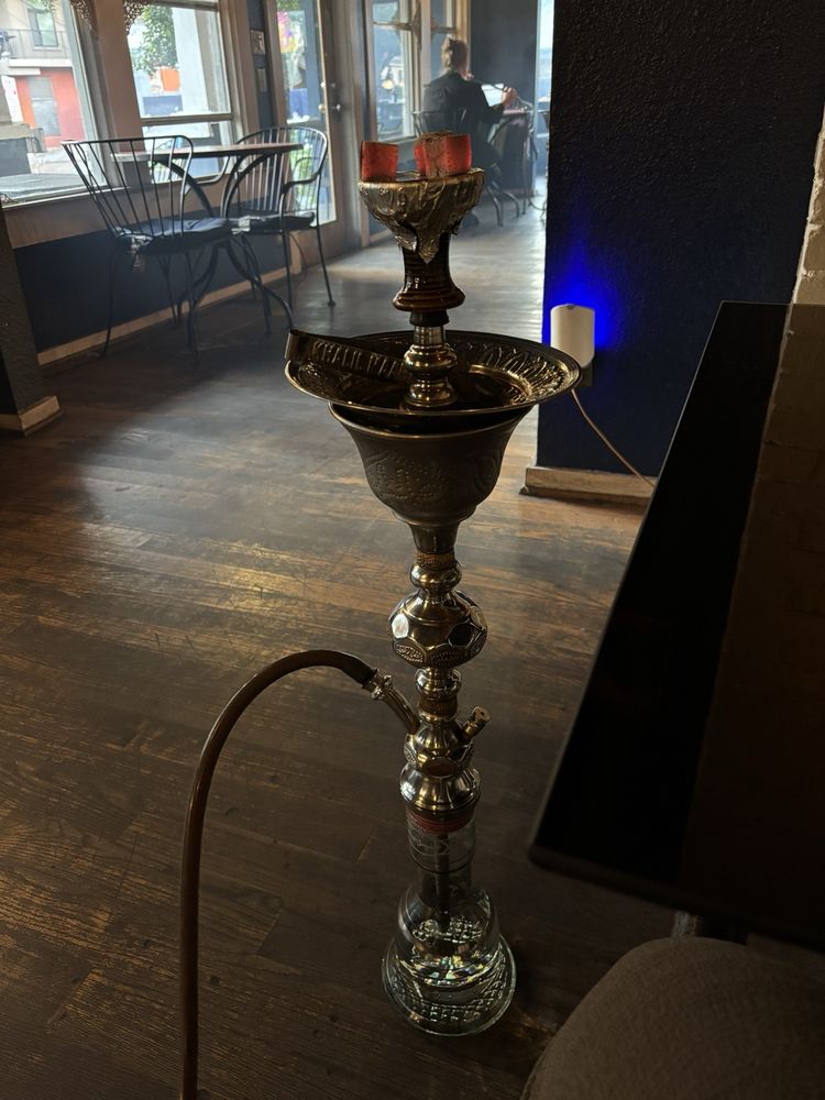 Arab Cowboy Cafe & Hookah Lounge Logo