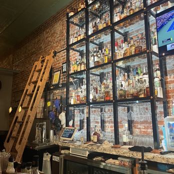 Bourbon Trail - a bar with a ladder leaning against the wall - Speakeasies Near Me - Fremont, Nebraska Bourbon Trail - a bar with a ladder leaning against the wall - Speakeasies Near Me - Fremont, Nebraska