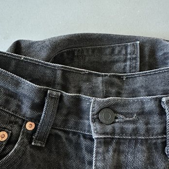 Levi’s Store - Replacement button in matte black on my vintage 550's, also done by Cayla at the Tailor Shop in Emeryville. - Men's Clothing Near Me - Emeryville, California