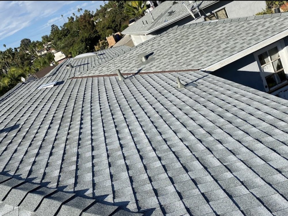 Slide of Delino’s Roofing & Remodeling