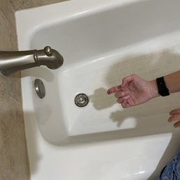 Filthy bath tub stained my finger