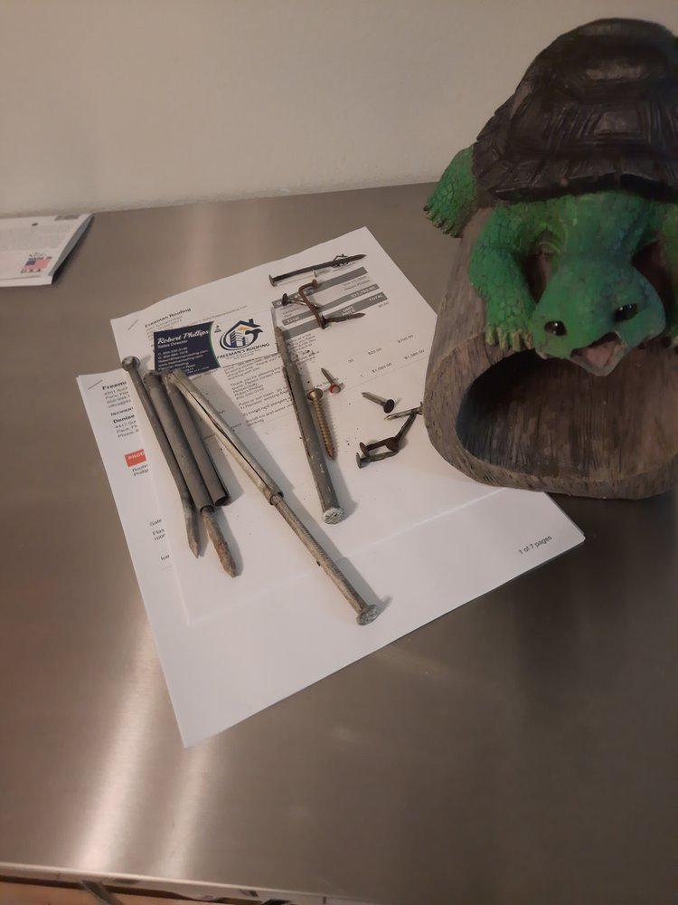 Slide of Freeman Roofing