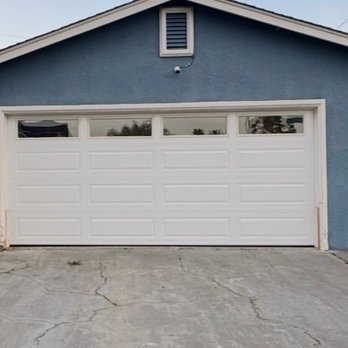 Safety Garage Door - New insulated door with windows. - Garage Door Services Near Me Safety Garage Door - New insulated door with windows. - Garage Door Services Near Me