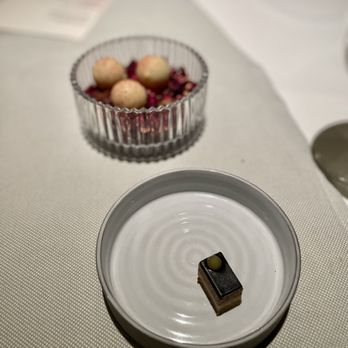 Indienne - Dessert of opera cake and a mango lassi truffle - Indian Near Me - Chicago, Illinois Indienne - Dessert of opera cake and a mango lassi truffle - Indian Near Me - Chicago, Illinois