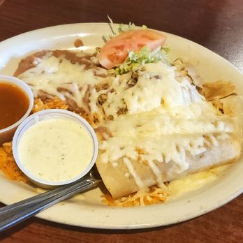 Taqueria Dos Compadres - Pick three combo: one chicken tamale, two chicken enchiladas, with rice and beans. Sauces on the side. - Mexican Near Me - Modesto, California Taqueria Dos Compadres - Pick three combo: one chicken tamale, two chicken enchiladas, with rice and beans. Sauces on the side. - Mexican Near Me - Modesto, California