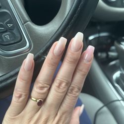 My left hand she shaped the middle nail different from the rest