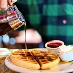 Sundog Visuals - A waffle being smothered in syrup at Cornucopia on 5th Street. Taken by Sundog Visuals.