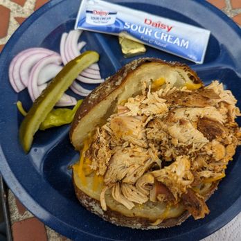 Bedlam BAR-B-Q - Loaded Baked Potato, $12 prior to tax. Shown with chicken and items placed on the side - Barbeque Near Me - Oklahoma City, Oklahoma Bedlam BAR-B-Q - Loaded Baked Potato, $12 prior to tax. Shown with chicken and items placed on the side - Barbeque Near Me - Oklahoma City, Oklahoma
