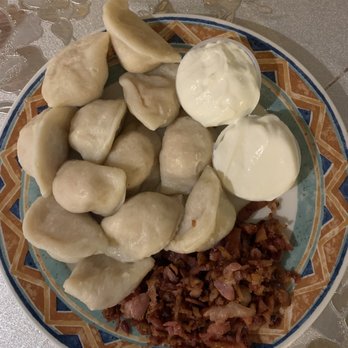 Ukrainian Village - 12 piece perogies with side of bacon and extra sour cream - Ukrainian Near Me - Vancouver, British Columbia Ukrainian Village - 12 piece perogies with side of bacon and extra sour cream - Ukrainian Near Me - Vancouver, British Columbia