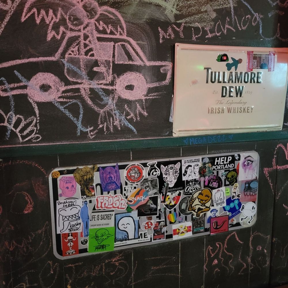 Gil's Speakeasy Tavern - a chalkboard with stickers on it - New American Near Me - Portland, Oregon Gil's Speakeasy Tavern - a chalkboard with stickers on it - New American Near Me - Portland, Oregon