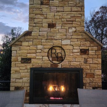 The Spa at Rock Barn - Fireplace...outside on the deck next to yet another jacuzzi  #Brilliant - Day Spas Near Me - Conover, North Carolina