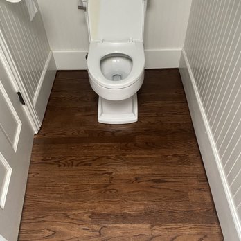 Abh Hardwood Floors - a toilet in a bathroom - Refinishing Services Near Me Abh Hardwood Floors - a toilet in a bathroom - Refinishing Services Near Me