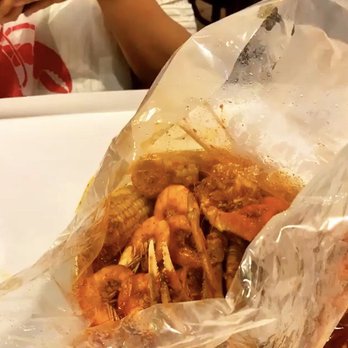 Star Crab - Shrimp, snow crab legs, potatoes, and corn in full house sauce - Cajun/Creole Near Me - Upland, California Star Crab - Shrimp, snow crab legs, potatoes, and corn in full house sauce - Cajun/Creole Near Me - Upland, California