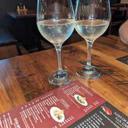 two wine glasses on a table