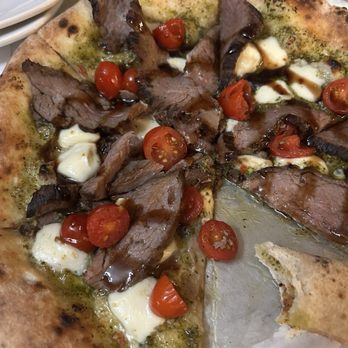 Muddled Thyme - Pizza special - flank steak, pesto, mozzarella, cherry tomatoes and balsamic glaze - Bars Near Me - Winona, Minnesota