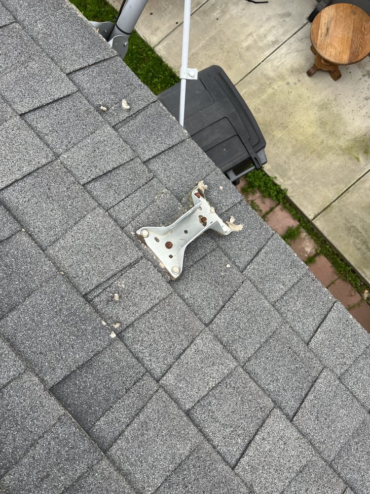 Slide of Milan Roofing