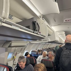 American Airlines - Room in overhead bins.