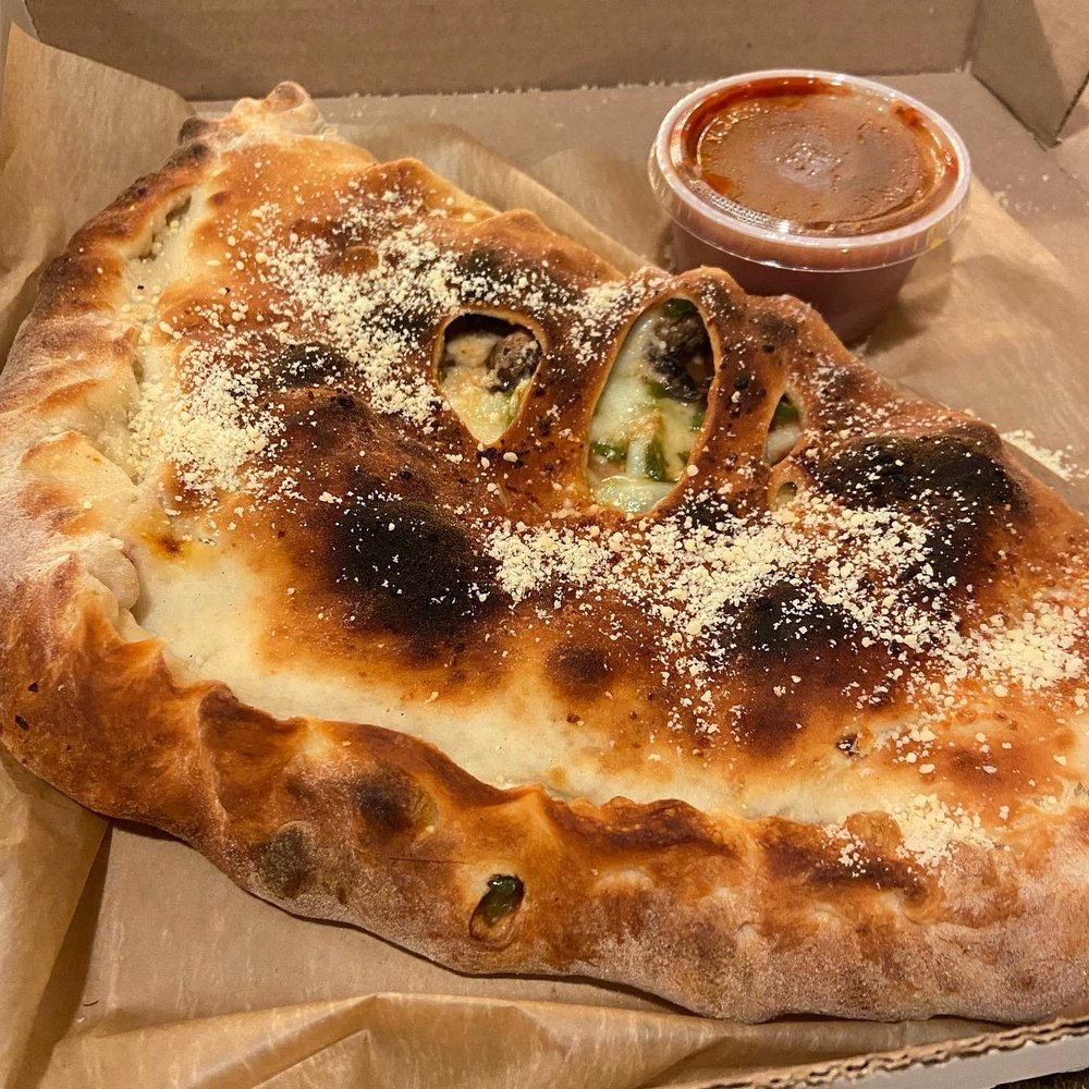 Food from Tapped Brick Oven & Pour House